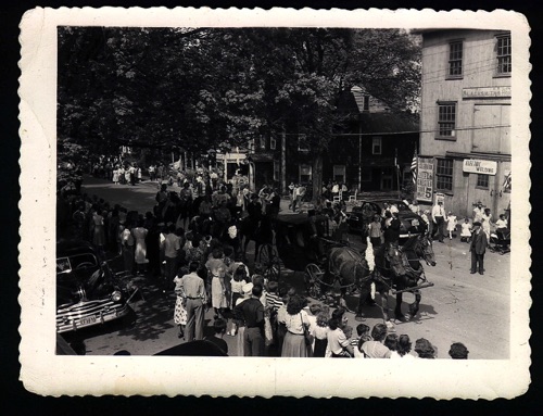 Horse drawn Carriage in front of A. B. Lord’s Blacksmith shop. 100th Hambletonian Anniversary Parade, Thursday May 5, 1949. chs-003429